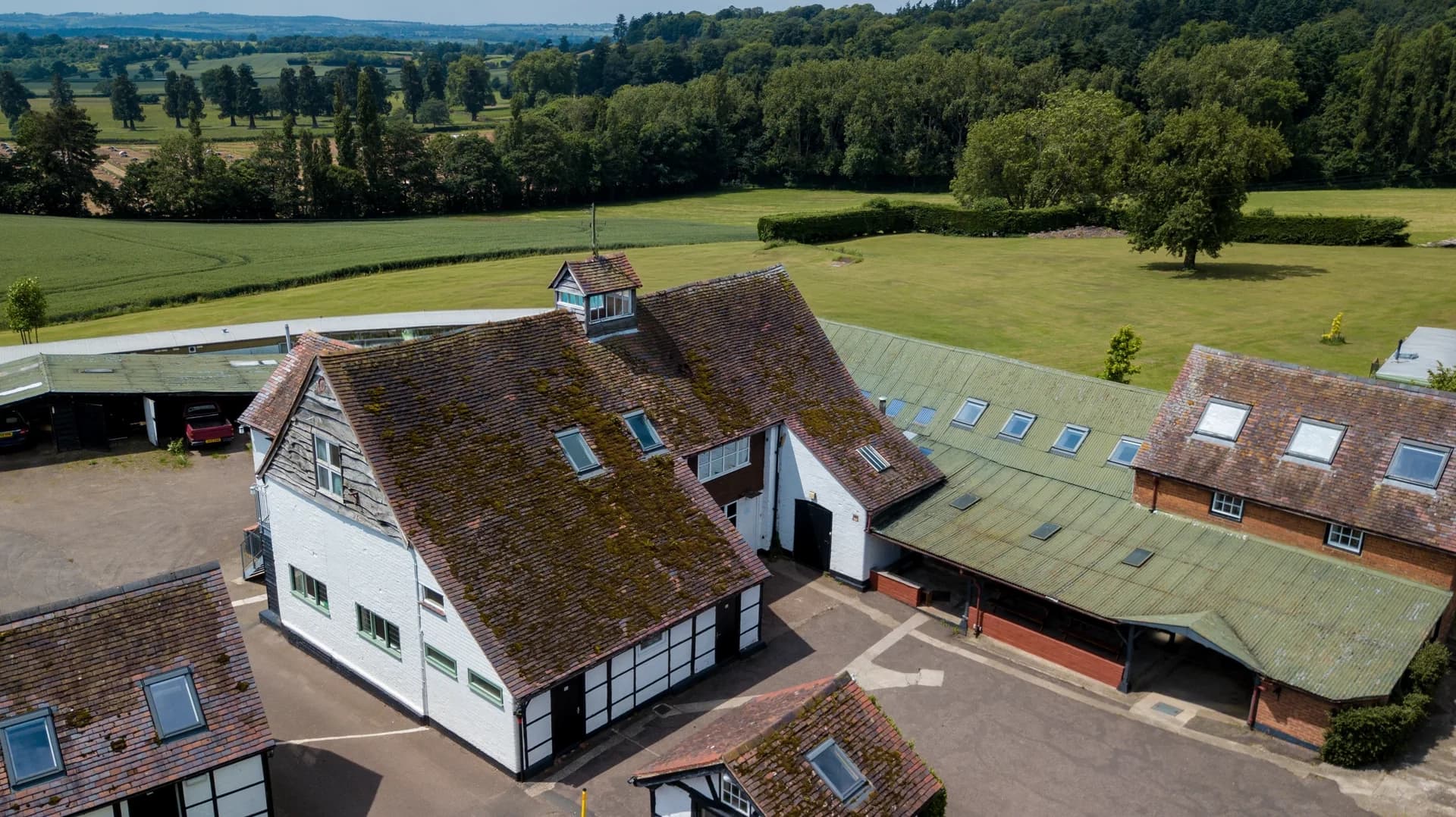 Aerial view of The Poplars historic buildings and accommodation